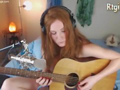 cute skinny tgirl play guitar for her fans