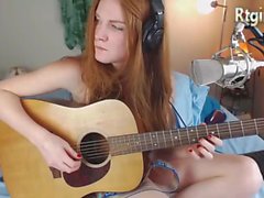 cute skinny tgirl play guitar for her fans