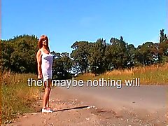 T-girl walks along the road in her undies