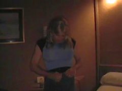 Flaming blonde crossdresser sucks on cam